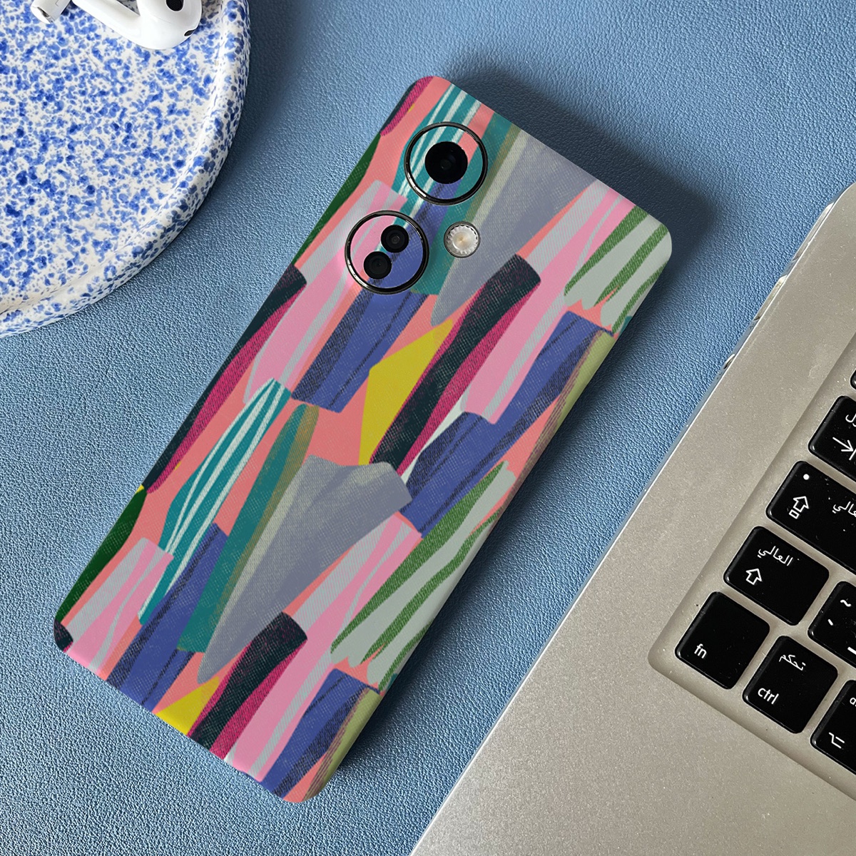 Colourful designer mobile skin applied to a smartphone