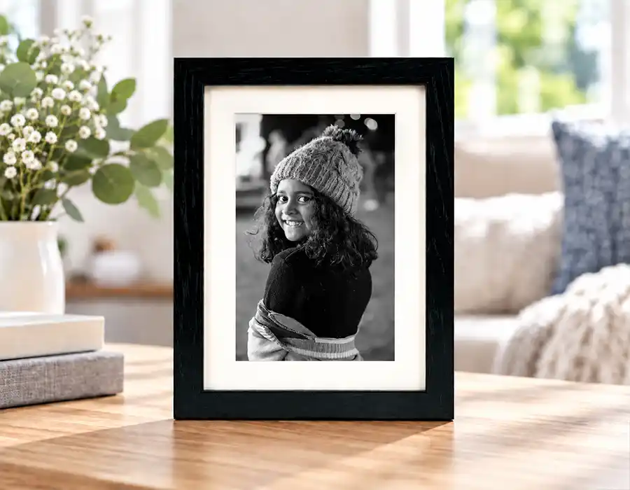 Child's photograph displayed in a personalised photo frame