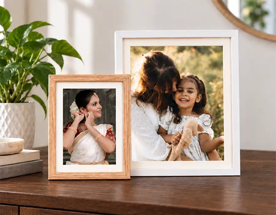 Personalised photo frames displayed on a living room table