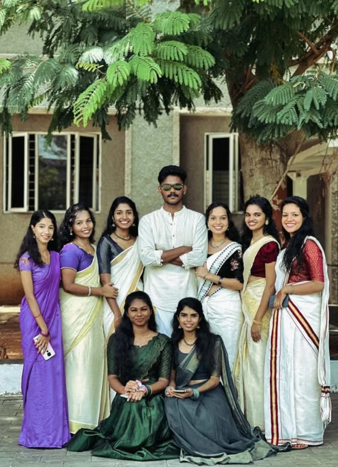 College friends dressed for Onam
